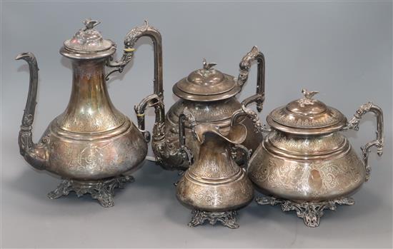 A French engraved white metal four piece tea and coffee service, gross 70 oz.